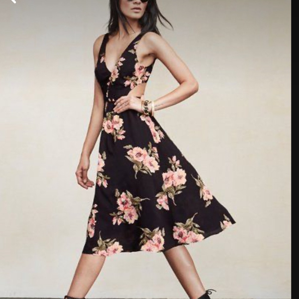Reformation black with pink floral print midi “cut out” dress.